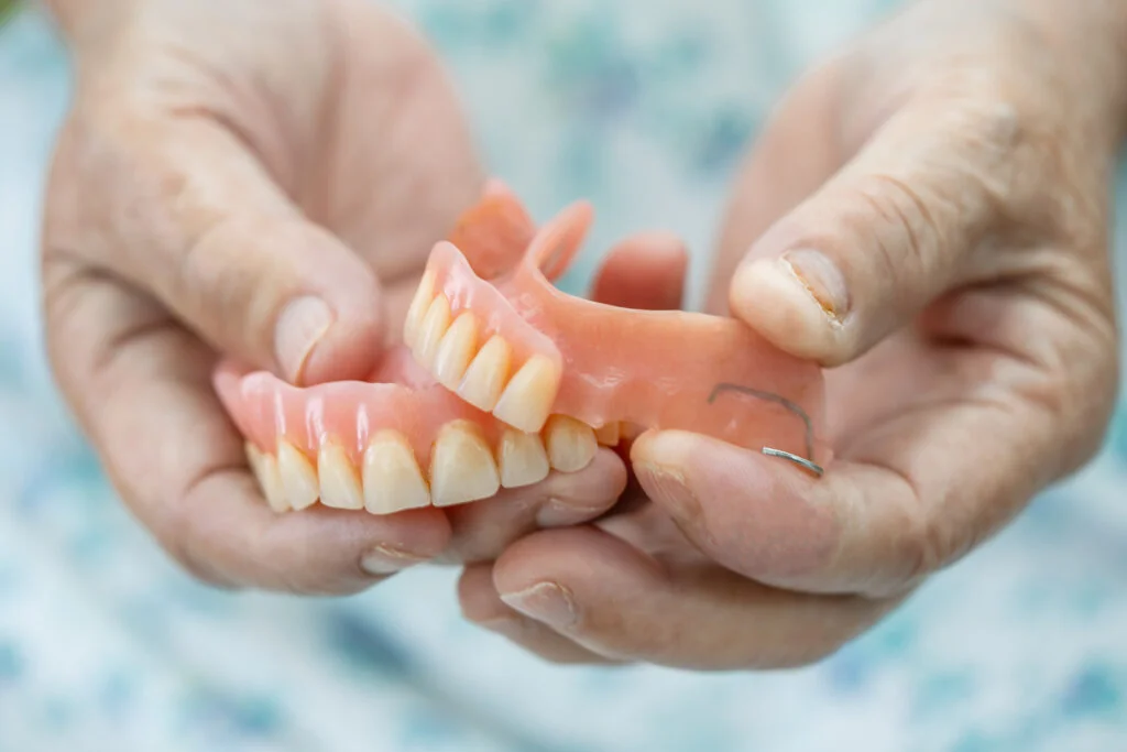 Dentures 17 asian elderly old woman patient holding to use den 2023 11 27 05 02 24 utc