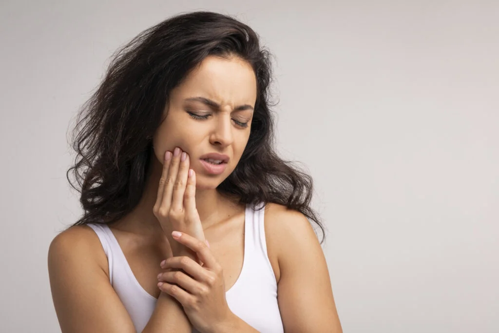 Minor Oral Surgery 8 upset millennial woman suffering from strong tooth 2023 11 27 05 31 41 utc 1