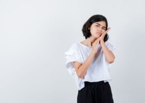 Woman experiencing braces pain